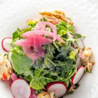The Prime Salad · Jumbo lump crab meat, bibb lettuce, arugula, radish, and spicy oil.