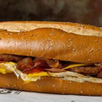 Hat Trick   (Hero) · 3 eggs ham, bacon & cheese served on a hero.