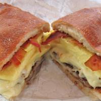 Hungry Man  · 3 eggs, ham, bacon, sausage, cheese.