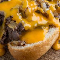Phillys Cheese Steak · grilled roasted beef, onion, green pepper, melted american cheese.