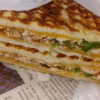 Chicken Fajita Panini
 · Grilled chicken, cheddar cheese, roasted peppers, caramelized onions and salsa. Hot grilled ...