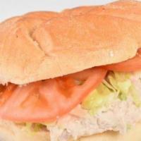 Healthy Tuna Sandwich · Local tuna, lettuce and tomato on whole wheat bread.