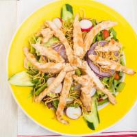 Chicken Oriental Salad · Mixed greens topped with marinated oriental chicken and Chinese noodles with an Asian sesame...
