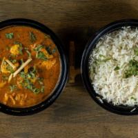 26 Paneer Butter Masala · Homemade cottage cheese steamed in rich, creamy tomato sauce
