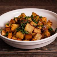 Potato Loves Mushroom · Top menu item. Cubes of potatoes pan-fried and topped with sautéed mushrooms and onions.