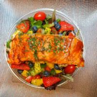 Salmon Salad · With mixed greens, peppers, mangos, strawberries, blueberries, cucumbers, cherry tomatoes, t...