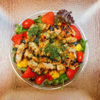Grilled Chicken Salad · With mixed greens, peppers, mangos, strawberries,  blueberries, cucumbers, cherry tomatoes, ...