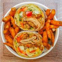 Veggie Wrap · Juicy veggie patty wrapped with lettuce, tomatoes, red onions, peppers, cucumber, mangos, av...