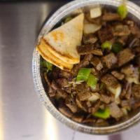 Gyro Meat · Cooked on the spit and sautéed with onions and green peppers.
