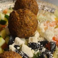 Falafel · Vegetarian. Ground chickpea balls seasoned and fried.