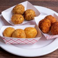 Stuffed Chicken Mini Bombs (18 Pieces) · chicken nuggets with a center full of flavorful sauces