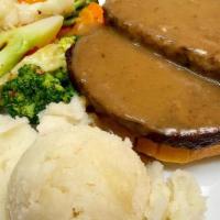  Baked Meatloaf · Mama's homemade recipe, with brown gravy served with mashed potato and vegetables.