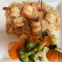 Shrimp Scampi
 · Shrimp sautéed in a garlic scampi sauce, served over rice.