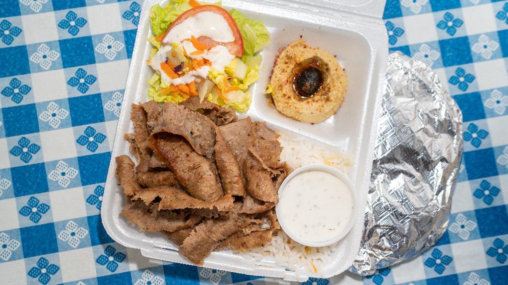Gyro Plate · Popular. Marinated slices of beef and lamb seasoned with herb and spices. Served with hummus, salad, rice, tzatziki sauce, and 1 pita bread.