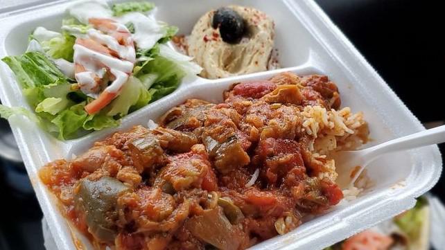 Roasted Eggplant Plate  · Vegetarian. Roasted eggplant, tomatoes, peppers, onions and garlic mixed with herbs and spices, served with rice, pita and salad.