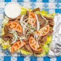 Gyros Salad  · Popular. Marinated slices of beef and lamb, topped with lettuce, tomato, and onion. Served w...