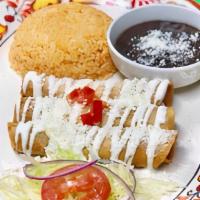 Flautas · Deep-fried tacos served with lettuce, tomatoes, cream and cheese. Served with rice and beans...