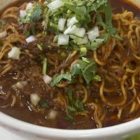 Birria Ramen  · Pasta noodles with birria broth and cilantro and onions on the side.
