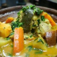 Lamb & Vegetable · Lamb shank stewed in our saffron sauce, topped with potatoes, and carrots