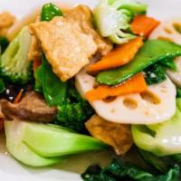 Sauteed Assorted Veggie And Tofu / 素八珍 · Served with choice of white or brown rice / 附白飯或糙米。.