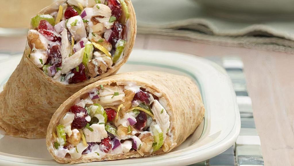 Chicken Salad Wrap · Cranberry chicken salad with spring greens and tomatoes. Served in a flour wrap with a side salad.