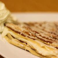 Cinnamon Roll Crepe · Melted sweet cream, cinnamon sugar in cinnamon swirled crepe, and topped with icing.