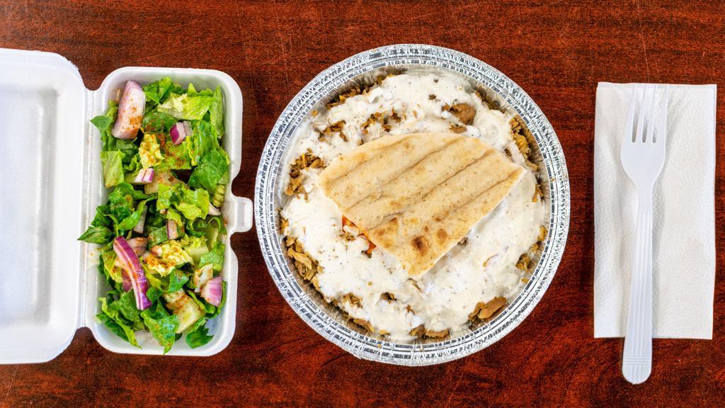 Chicken Over Rice · Served with pita bread and salad.