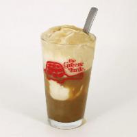 Root Beer Float · Two scoops of vanilla ice cream served with your own frosty bottle of Greene Turtle Root Beer.