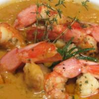 Sautéed Shrimps · Served with cannellini beans in a white wine sauce.