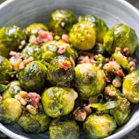 Brussels Sprouts · Roasted brussels sprouts with pancetta, Pecorino Romano DOP and parsley.