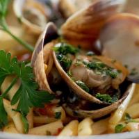 Spaghetti Alle Vongole · Sautéed clams, cherry tomatoes, garlic and parsley.