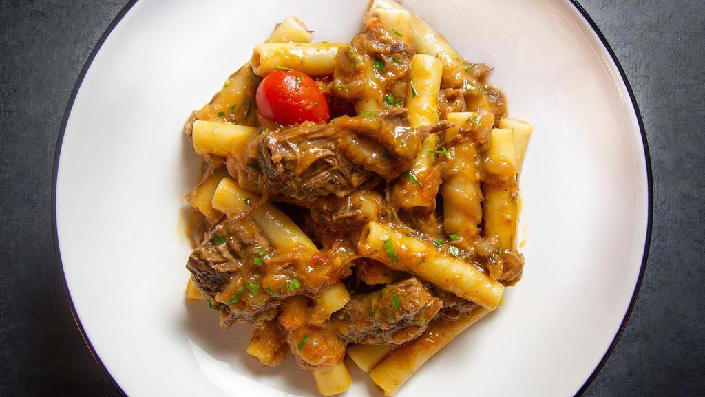 Ziti Alla Genovese · Slow cooked onions ragu with veal.