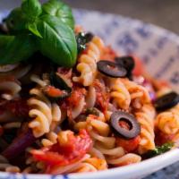 Fusilli Pasta Lla Puttanesca  · vegetarian sauce made with tomatoes extravirgin olive oil Sicilian Capers, parsley , gaeta b...