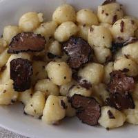 Black Truffle Gnocchi · Porcini mushrooms and potatoes gnocchi, black truffle sauce, shaved black truffle.
