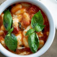 Sorrentina Gnocchi  · Potatoes gnocchi, san marzano tomatoes, fresh fior di latte and basil.