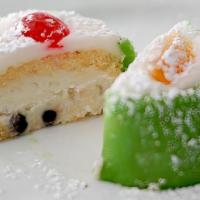 Cassata Siciliana · Traditional Sicilian sponge cake layered with ricotta cheese and covered with a shell of mar...