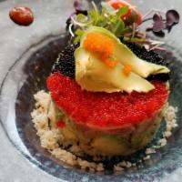 Tuna Tartare · Tuna, avocado and tobiko in special sauce with Japanese dressing on the side.