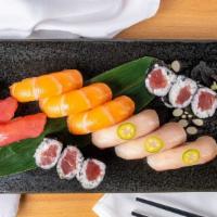 Tri-Color Sushi · Three pieces of tuna, three pieces of salmon, three pieces of yellowtail and one tuna roll. ...