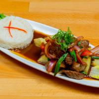 Saltado (Sautée) · Sautéed onions and tomatoes with fries served with rice and your choice of protein.