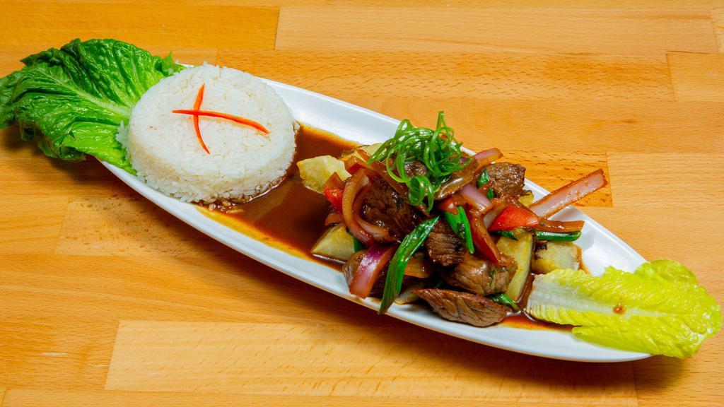 Saltado (Sautée) · Sautéed onions and tomatoes with fries served with rice and your choice of protein.
