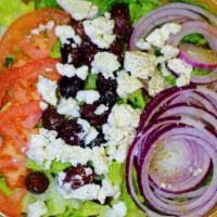Greek Salad · Crispy romaine, feta, cheese, fresh tomatoes, red onion, calamata olives, oil and oregano.
