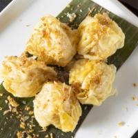 Chicken & Shrimp Dumplings · Steamed chicken & shrimp dumplings with sweet soy sauce.