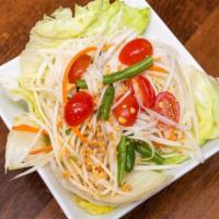 House Salad · Lettuce, tomatoes, cucumbers, bean sprouts, carrot with peanut dressing.
