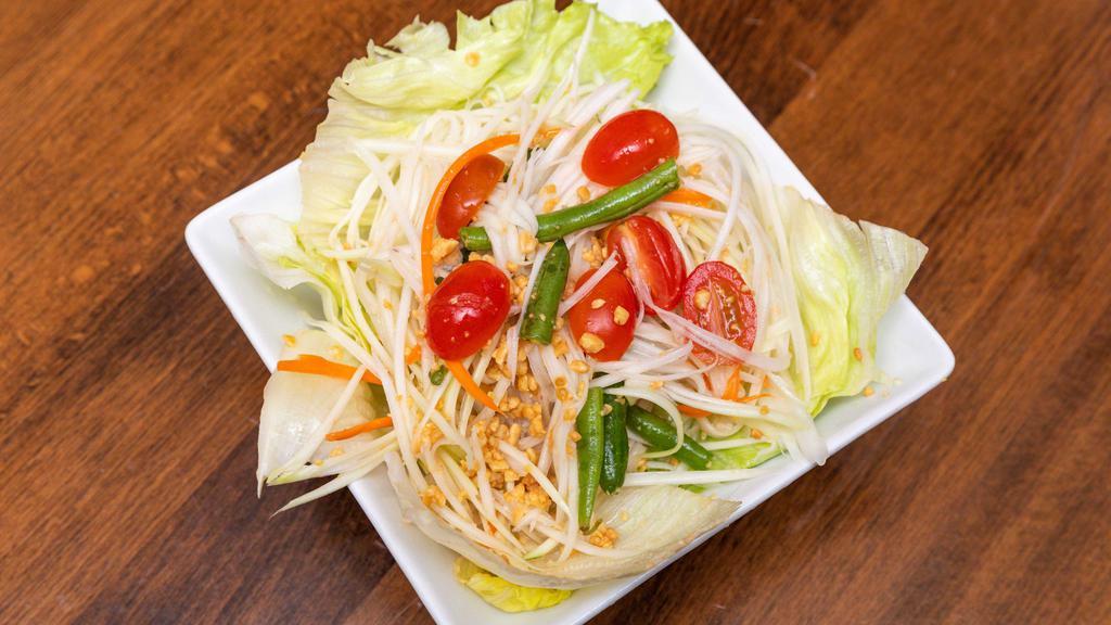 House Salad · Lettuce, tomatoes, cucumbers, bean sprouts, carrot with peanut dressing.