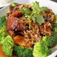 Duck Tamarind · Spicy. Crispy duck, steamed broccoli, carrot with tamarind sauce served with jasmine rice.