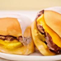 Hihi System Sliders · Two Steamed Beef Patties, American Cheese, Onion, Pickles, Comeback Sauce, Martin's Rolls.