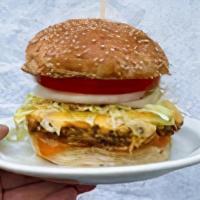 Big Veggee Burger · Griddled Mushroom/ Cabbage Patty, American, Cheddar, L T O, Pickles, Sauce, Seeded Bun + Fri...
