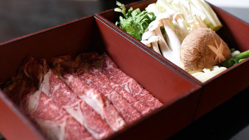 Diy Kobe Beef Shabu Shabu  · Thin sliced Kobe beef, mushrooms, vegetables, homemade udon noodles. Served with sesame sauce for dipping. *This shabu shabu is served UNCOOKED and DOES require in-home preparation.