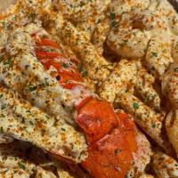 Lobster · 1 4 oz lobster with6 shrimp over rice or pasta. All rice orders come withcorn!