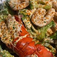 Lobster And Broccoli Entree  · 1 4oz lobster over rice or noodles with 6 shrimp drizzled with my famous boss sauce!!!